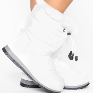 Fashion Nova “Baby it’s Cold Flat Boots”